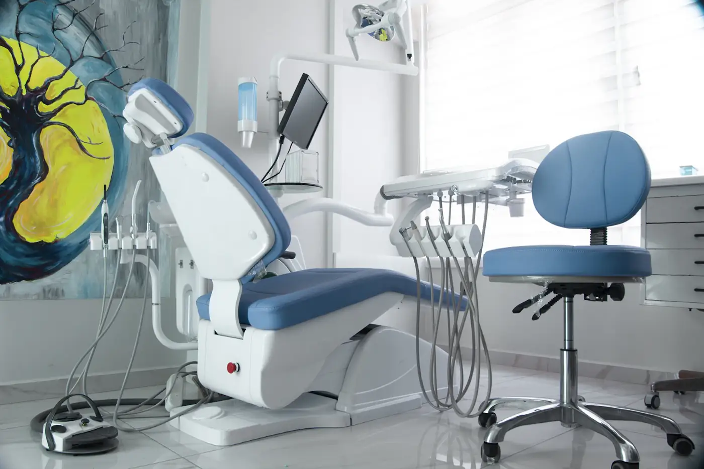 Blue and white treatment room full of daylight