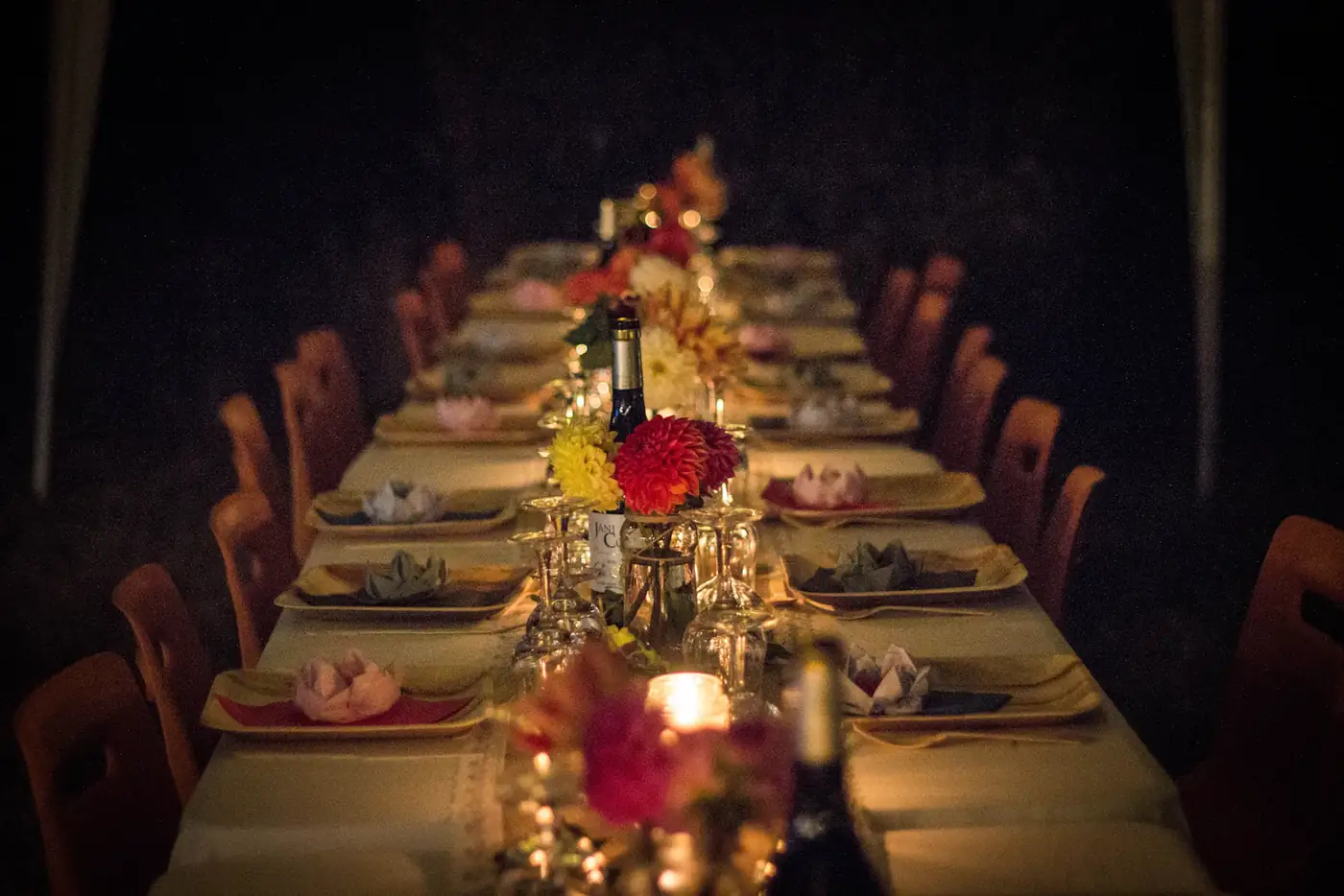 Candlelit dinner table at night