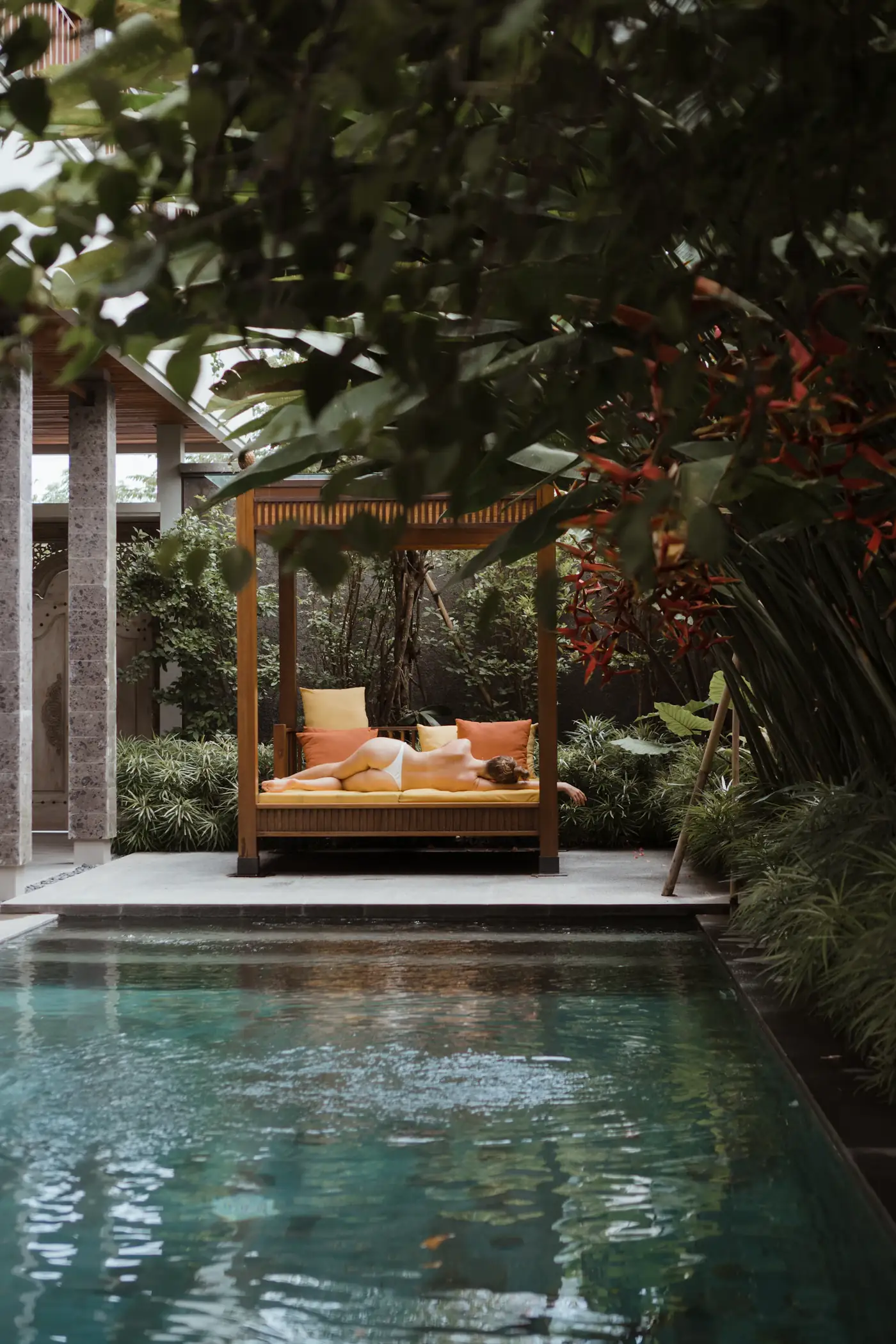 Pavilion daybed above a jungle pool