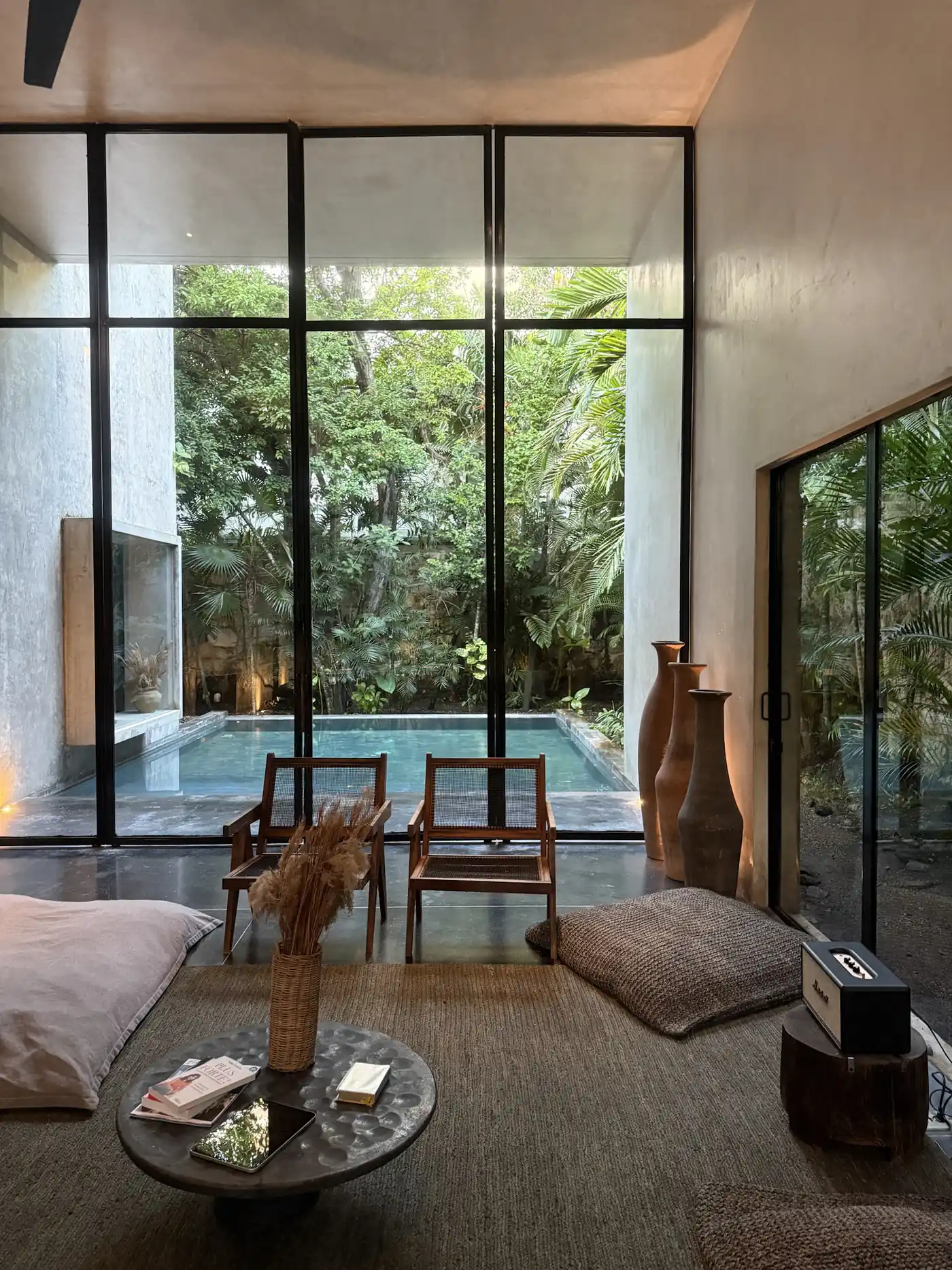 Living room open to the pool