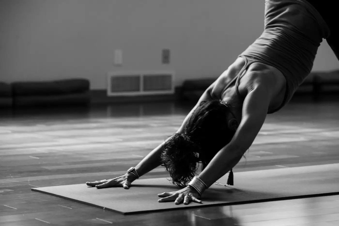 Black and white photo of a downward dog pose